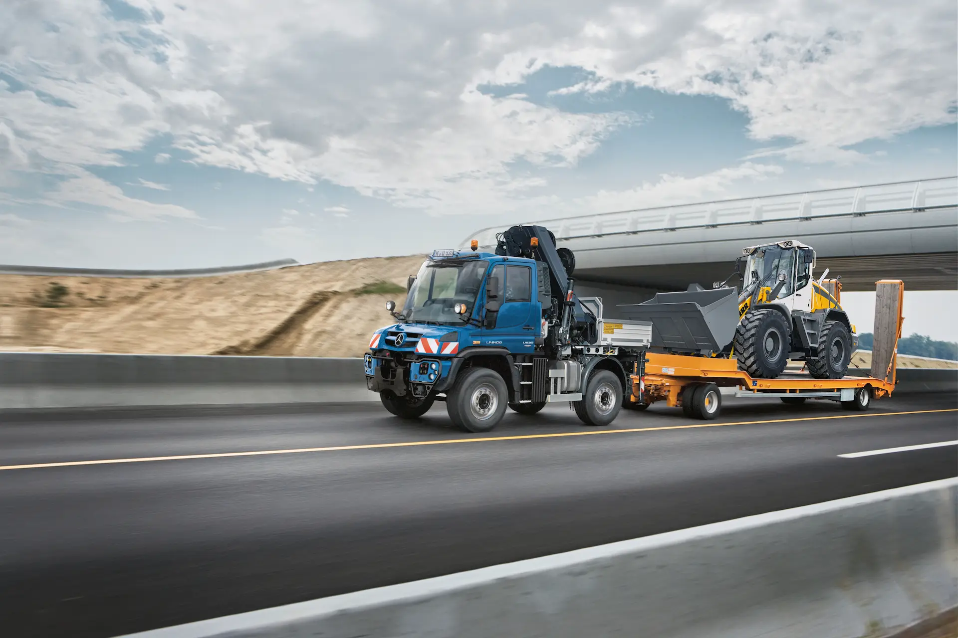 Unimog veža traktorių