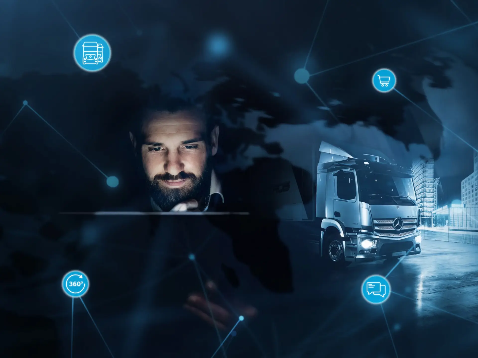 Savininkas stebi sunkvežimio parametrus, fone sunkvežimis